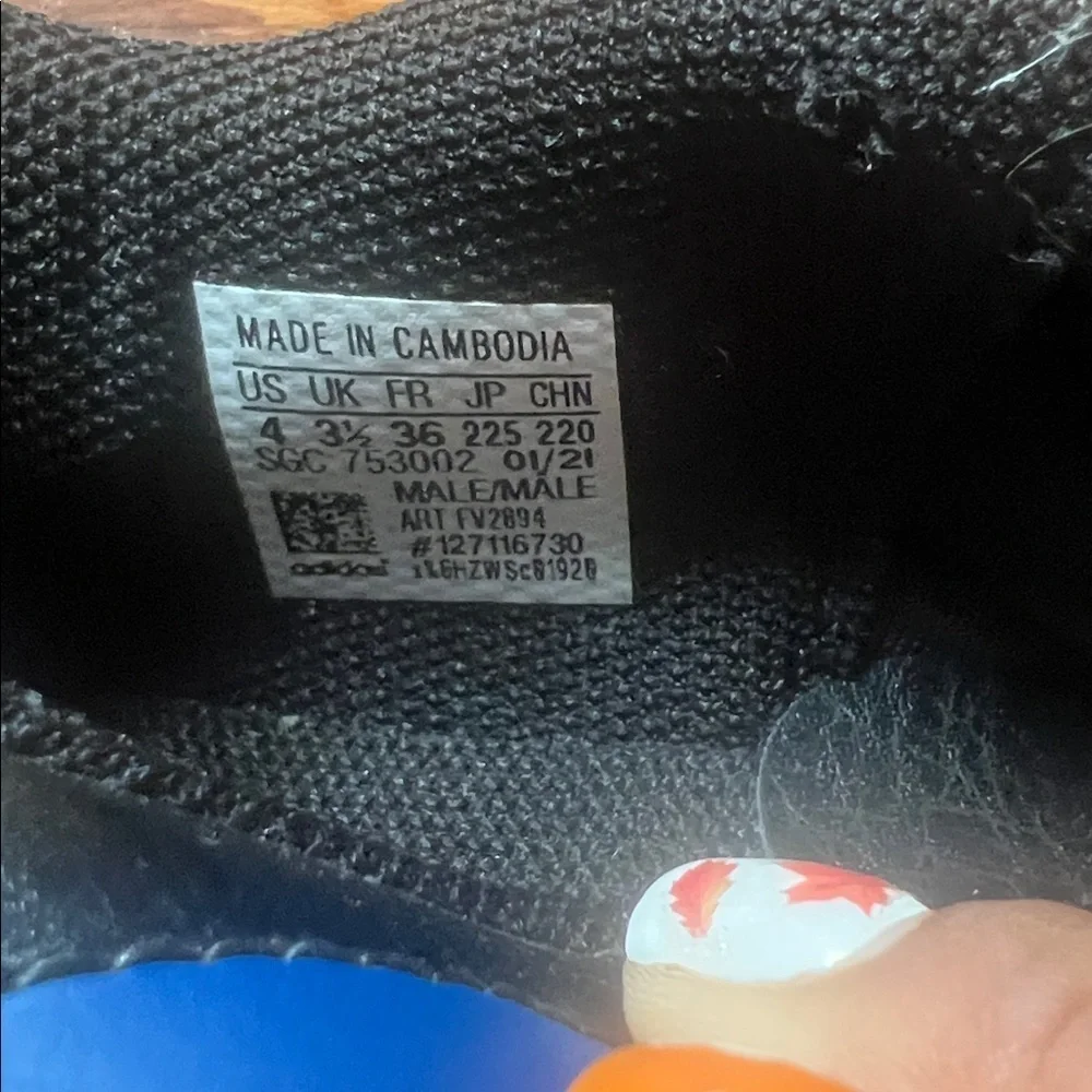Adidas Black and Blue Athletic Cleats